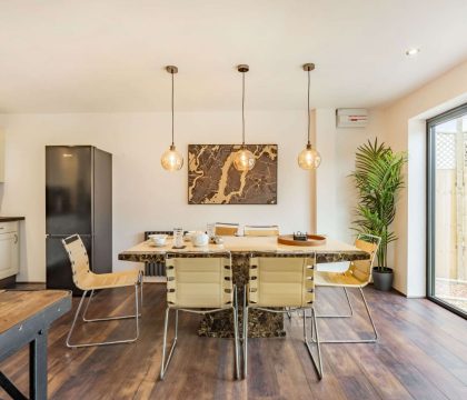 The Old Garage Dining Area - StayCotswold