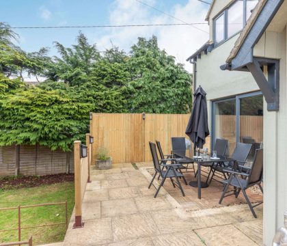 The Old Garage Patio Area - StayCotswold