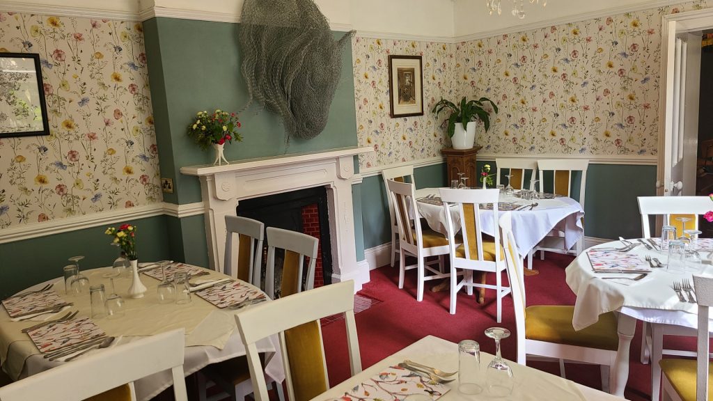The Old Rectory Restaurant & Sculpture Gardens Dining Room with tables and chairs