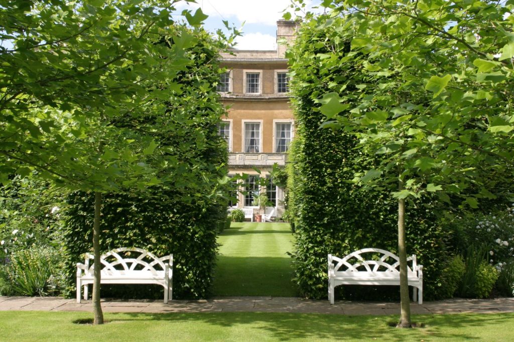 Badminton Estate Gardens with two benches