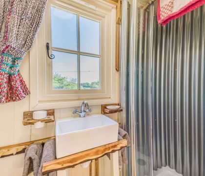 Littlestock Shepherd's Hut Bathroom - StayCotswold