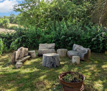 Hill View House Seating by Stream - StayCotswold