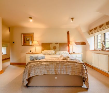 The Old Dairy Master Bedroom - StayCotswold