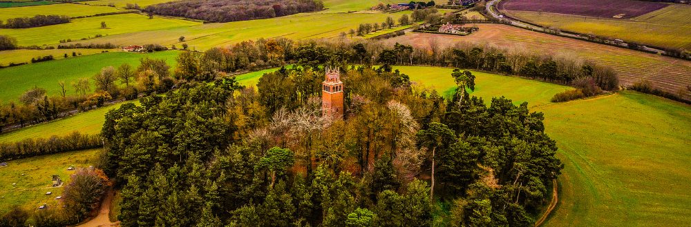 Stunning view in the Cotswolds of a church surrounded by the trees