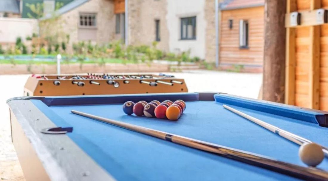 Pool table and foosball table in a Cotswold holiday cottages for large groups