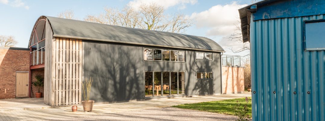A Converted Dutch Barn Holiday Home in the Cotswolds with a shepherd's hut 