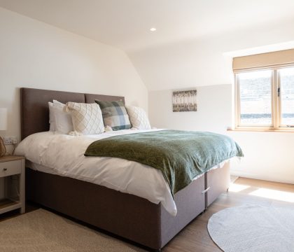 The Puzzle House Master Bedroom - StayCotswold
