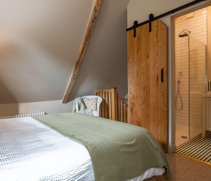 The Coach House Master Bedroom - StayCotswold