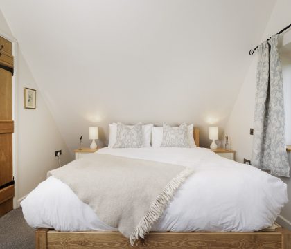The Nest at Robins Roost Master Bedroom - StayCotswold