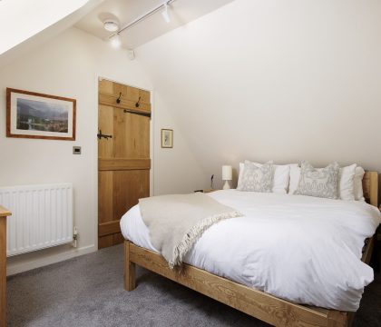 The Nest at Robins Roost Master Bedroom - StayCotswold