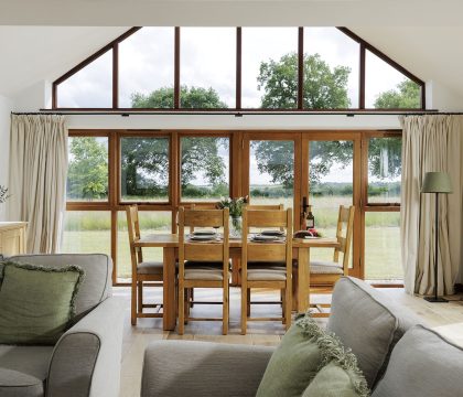 Hook Norton Barn Dining Area - StayCotswold