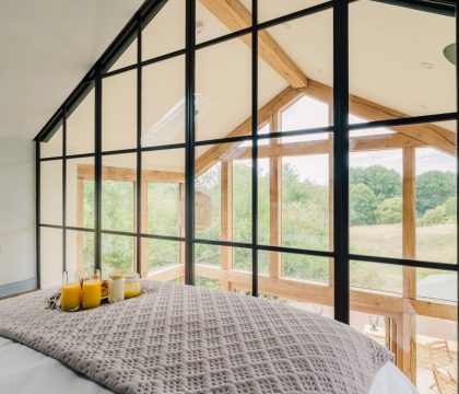 The Tractor Shed Master Bedroom - StayCotswold