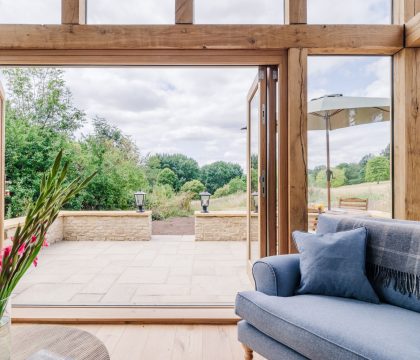 The Tractor Shed Sitting Area - StayCotswold