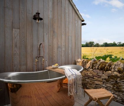 Apple Tree Cottage, Daglingworth outside bath - Stay Cotswold