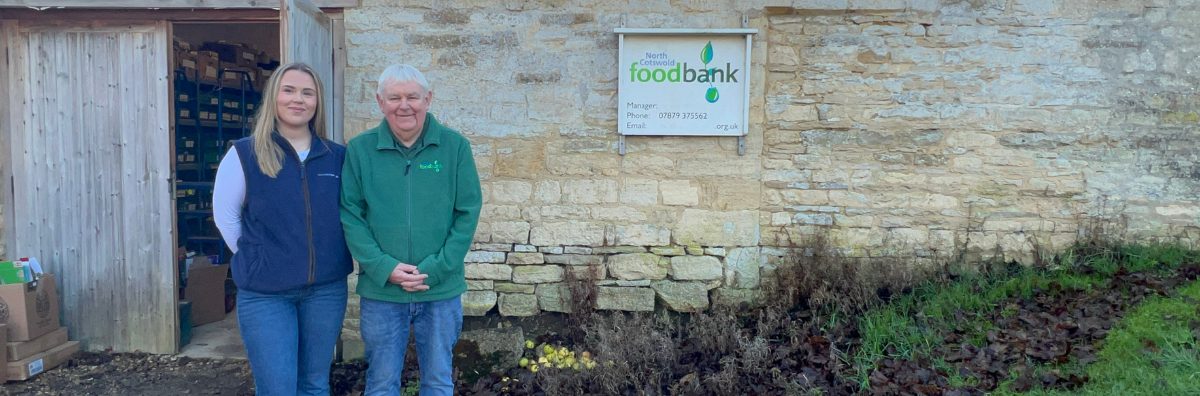 Lily from StayCotswold and Kevin from the North Cotswold Food Bank outsider the building in Guiting Power