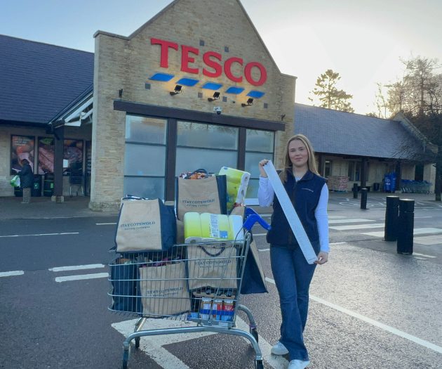 StayCotswold team member outside Tesco in Stow-on-the-Wold with bags of essentials and a long reciept