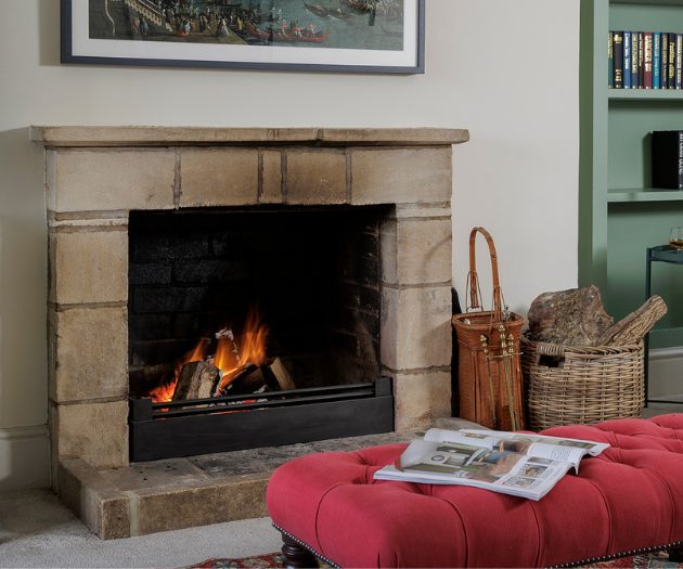 open log fire in cotswold holiday home