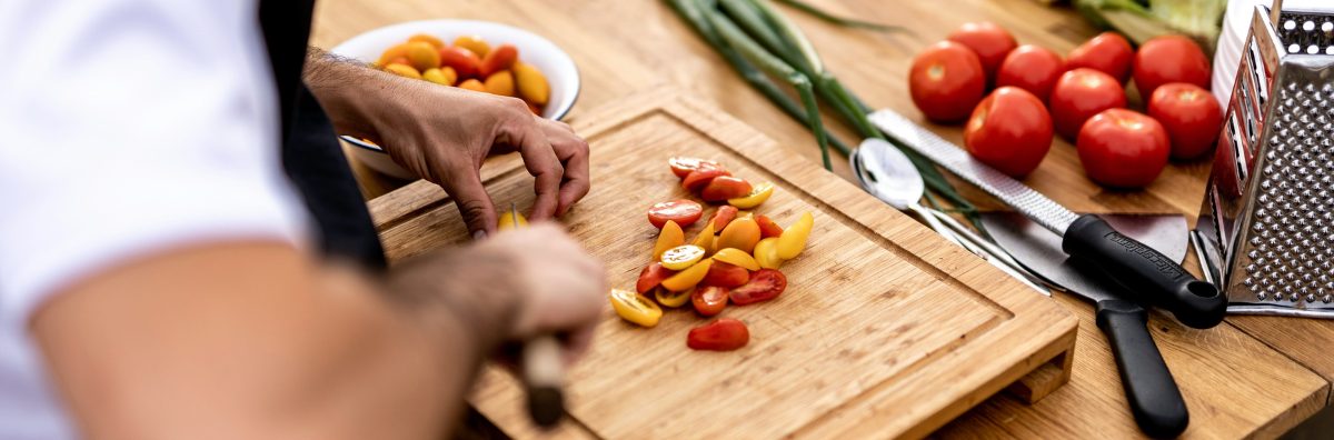Luxury Private Chefs in the Cotswolds Private chef cooking food in a kitchen