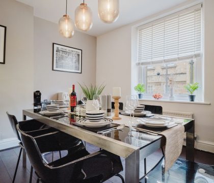 Licata's Apartment Dining Area - StayCotswold