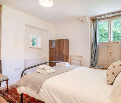 The Coach House Master Bedroom - StayCotswold
