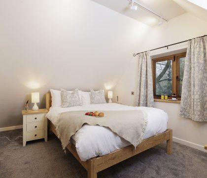 The Nest at Robins Roost Master Bedroom - StayCotswold