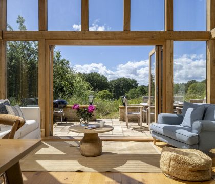 The Tractor Shed Sitting Area - StayCotswold