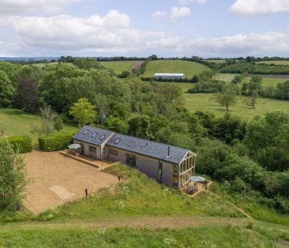 The Tractor Shed Outside - StayCotswold