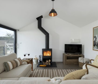 The Cattle Shed Sitting Room - StayCotswold